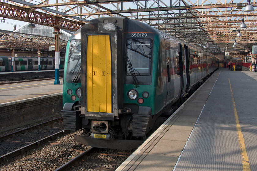 350129, LN 15.01 Crewe-Birmingham New Street (2G64, 3L), Crewe station 
 The next leg of our journey involved Andy and I travelling from Crewe to Stoke, this time courtesy of London Northwestern. with just a few minutes to go before departure 350129 will work the 15.01 to Birmingham via Stoke and Stafford but it still has no driver! 
 Keywords: 350129 15.01 Crewe-Birmingham New Street 2G64 Crewe station London North Western Desiro