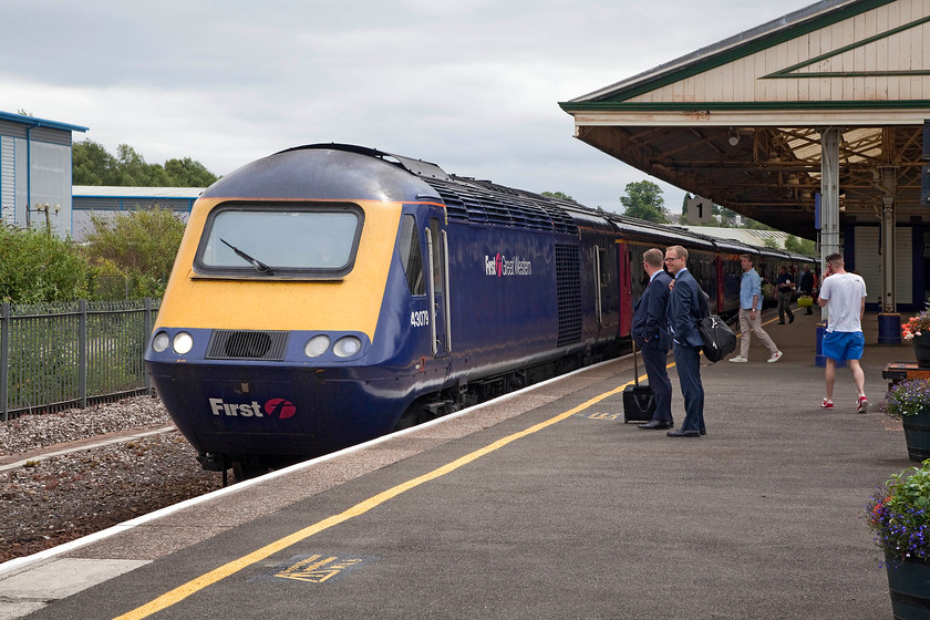 43079, GW 14.13 Paignton-London Paddington (1A87, 2E), Newton Abbot station 
 Andy and I saw this HST set a little earlier at Torre station about to complete its journey to Paignton. Here it is again a short distance into its journey at Newton Abbot station forming the 14.13 Paignton to Paddington. 43079 is leading the service that arrived a little early as opposed it its outward run that was a little late! 
 Keywords: 43079 1A87 Newton Abbot station