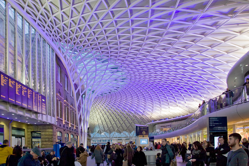 Concourse, London King's Cross station 
 In this view of the new departure concourse of King's Cross station, opened two years ago in 2012, the retailing mezzanine is see integrated into the structure. Whilst the whole structure is particularly striking and largely successful I do have a particular criticism. The toilet facilities are very poor with just one of each located at the far end of the mezzanine. They are pay facilities and very small with queues forming every time that I have visited so far. 
 Keywords: Concourse London King's Cross station