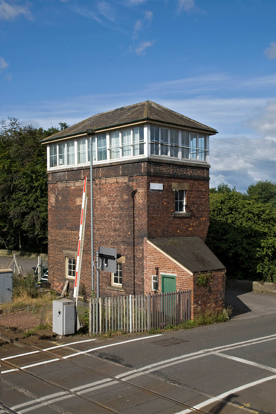 Prudhoe signal box (NE, 1872) 
 The North Eastern Railway built a number of these tall boxes throughout their network usually in an effort to aid sighting for the signalmen. Indeed, this box once controlled an extensive number of sidings to the southwest as well as controlling access to the dye works that was located behind the box on the banks of the River Tyne. Today, the Type N1 box dating from 1872 controls just a small number of semaphores around the station from its forty-five lever frame much of which will now be redundant with a lot of white-painted levers (oou). 
 Keywords: Prudhoe signal box 1872 North Eastern Railway