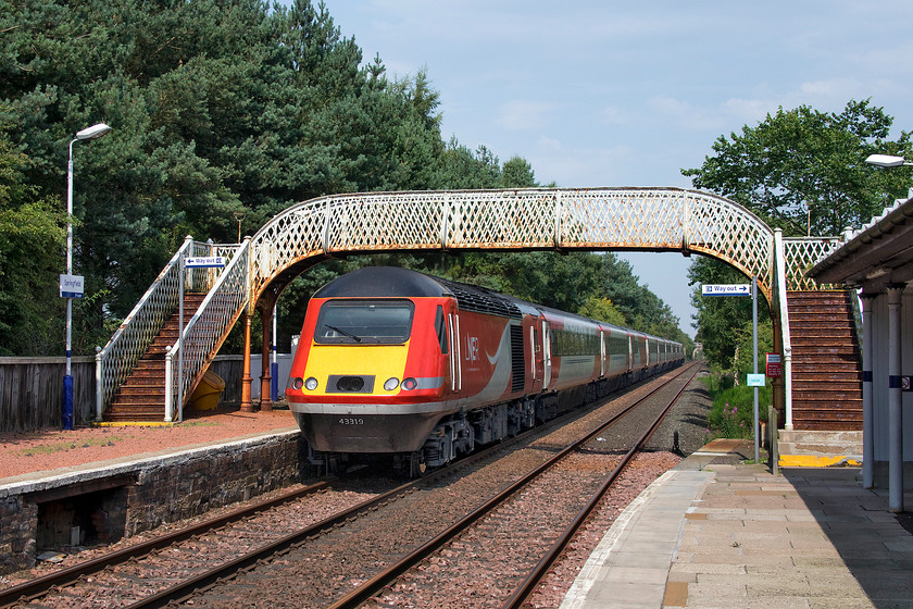 43319, GR 10.00 London King`s Cross-Aberdeen (1W11, 15L), Sprinfield station 
 Springfield station is a delightfully rural spot on the Edinburgh to Dundee Fife coast route with the peace and quiet only spoiled by the passing of trains. The 10.00 King's Cross to Aberdeen LNER HST passes under the typical wrought iron latticed footbridge with 43319 doing the work at the rear. Unfortunately, the station has a very poor number of trains calling with no Sunday services. Usage numbers, whilst in the ascendancy, are low and unlikely to increase much further unless ScotRail looks at the stopping pattern. 
 Keywords: 43319 10.00 London King's Cross-Aberdeen 1W11 Sprinfield station