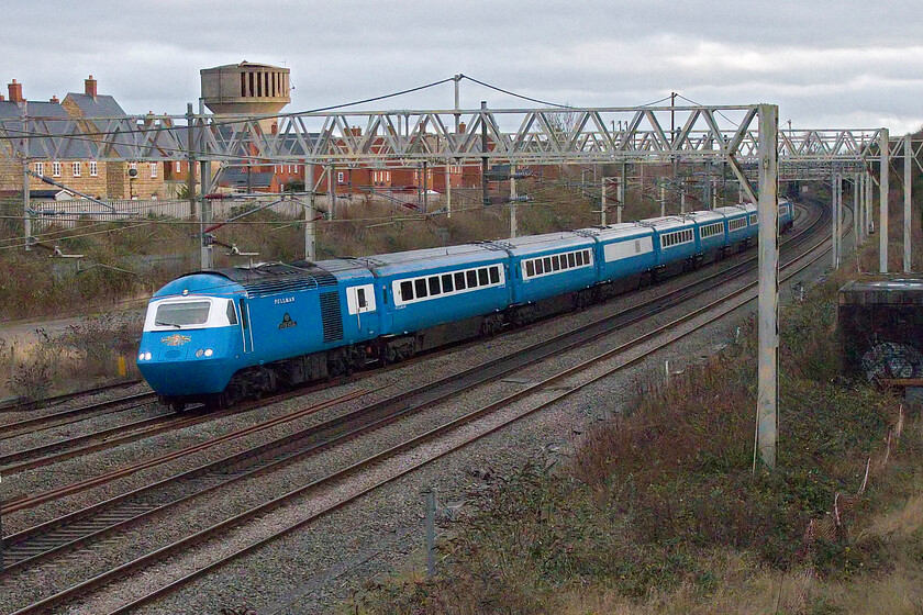 43059 & 43055, 14.05 Wembley Yard-Crewe HS (5Z35, 10E), site of Roade station 
 Having been involved in railtour duties yesterday working the Edinburgh Christmas Pullman one of LSL's Nankang blue sets returns to its Crewe headquarters. 43059 'Loch Shiel' leads the set with 43055 bringing up the rear past Roade running a little ahead of schedule. 
 Keywords: 43059 43055 14.05 Wembley Yard-Crewe HS 5Z35 site of Roade station Blue Pulman HST Loch Shiel