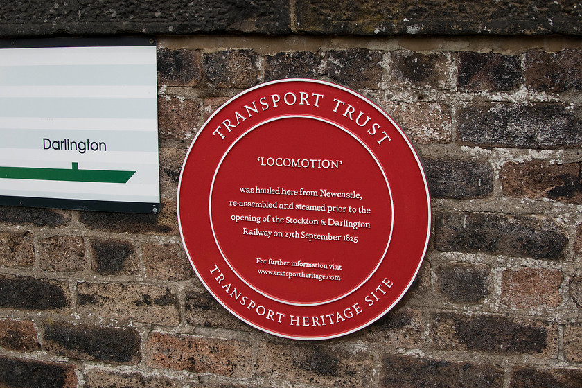 Transport Trust plaque, Heighington station 
 The historical value of the small and somewhat unremarkable station at the edge of an industrial estate at Newton Aycliffe named Heighington cannot be overemphasised. The Transport Trust says it all It was here in 1825 that Locomotion No. 1 designed by George Stephenson was placed on the track prior to its first journey, that is after somebody found a way to light the fire! It was also the scene of a tragedy and a disaster on 1 July 1828 when the boiler of Locomotion No. 1 exploded, killing the driver. 
 Keywords: Transport Trust plaque Heighington station