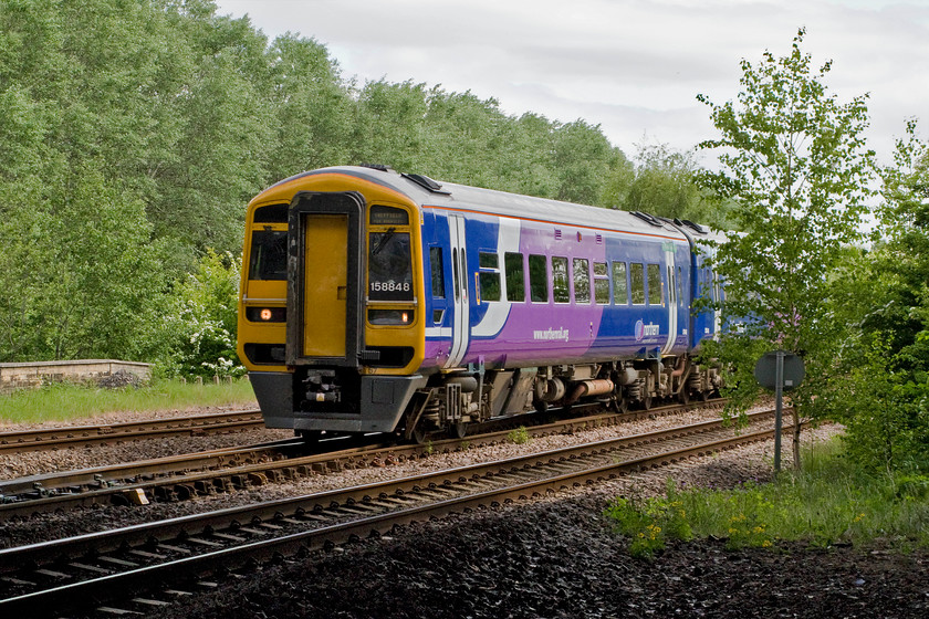 158848, NT 10.40 Leeds-Sheffield (1L81), Horbury Junction 
 Taken under the M1 overbridge at Horbury Junction, 158848 passes with the 10.40 Leeds to Sheffield service. There was once many more tracks at this location and being so close to the huge Healey Mills yard meant that it was a busy area, not least for coal traffic. 
 Keywords: 158848 10.40 Leeds-Sheffield 1L81 Horbury Junction Northern Rail Sprinter