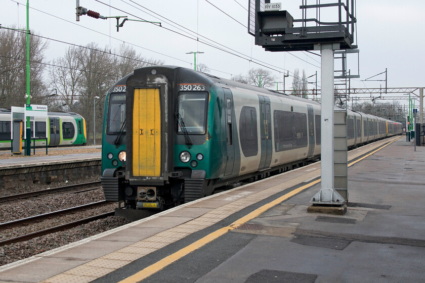 350263, LN 08.36 Birmingham New Street-London Euston, (1Y24, 4L), Northampton station 
 The first train of my busy day travelling with London Northwestern arrives at Northampton station. I took the 08.36 Birmingham New Street to Euston as far as Watford Junction worked by 350263 and another unidentified unit at the rear. I attempted to undertake some work on this website whilst travelling south but, as usual, the train's wifi, promoted as 'LOOP On Train Entertainment' was absolutely useless so I had to resort to hotspotting from my 'phone. 
 Keywords: 350263 08.36 Birmingham New Street-London Euston 1Y24 Northampton station London Northwestern Desiro