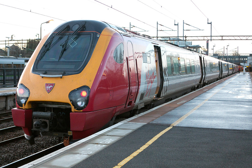 221107 & 221118, VT 06.20 Rugby-London Euston (1R03), Northampton station 
 Virgin operate an early morning commuter service that stops at Northampton. It utilises a Class 221 spare set on this day formed of 221107 'Sir Martin Frobisher' and 221118. This service, the 1R03 06.20 Coventry to Euston, does not have a corresponding evening return service as was the case in the past with the fabled loco. hauled 'Cobbler' workings. 
 Keywords: 221107 221118 06.20 Rugby-London Euston 1R03 Northampton station