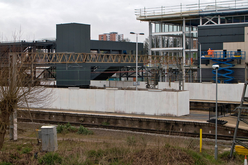 New station taking shape, from Westbridge 
 Taken from Northampton's Westbridge the new station is seen taking shape. With the main building to the right the new footbridge is to the left but they are yet to be united. With all this work, it is a tribute to the various teams involved that the station managed to stay open and fully operational. 
 Keywords: New station Northampton from Westbridge