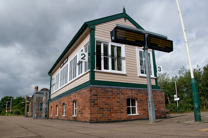 Helsby Junction signal box (LNW, 1900) 
 I have a number of photographs of Helsby Junction signal box, to give it its proper name, but they have been conventional ones so I opted for something a little different. With an extreme wide-angled view such as this, I would normally subject it to some Photoshop treatment to straighten out the converging verticals but not this time. The box is a superb London and North Western Type 4 structure dating from 1900 that has undergone a tasteful and sympathetic refurbishment by Railtrack back in 2007. My only criticism of this modernisation work is that the replacement window frames are clumsily thick necessitated by them being of UPVC construction. As the box is Grade II listed so when the inevitable replacement of the mechanical signalling takes place it will be retained on the platform perhaps going over to some sort of community use perhaps? 
 Keywords: Helsby Junction signal box L&NWR