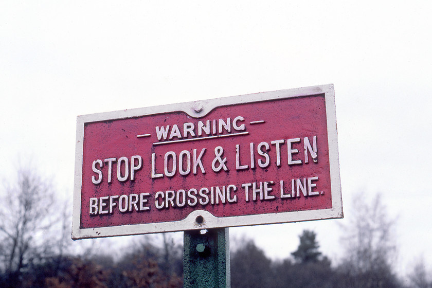 SR cast sign, Shere TQ069468-28.12.80 
 Whilst following our walking route we crossed the railway at Shere approximately halfway between Guildford and Dorking. At the foot crossing on Shere Heath, this former Southern Railway cast sign was still warning pedestrians. 
 Keywords: SR cast sign Shere TQ069468