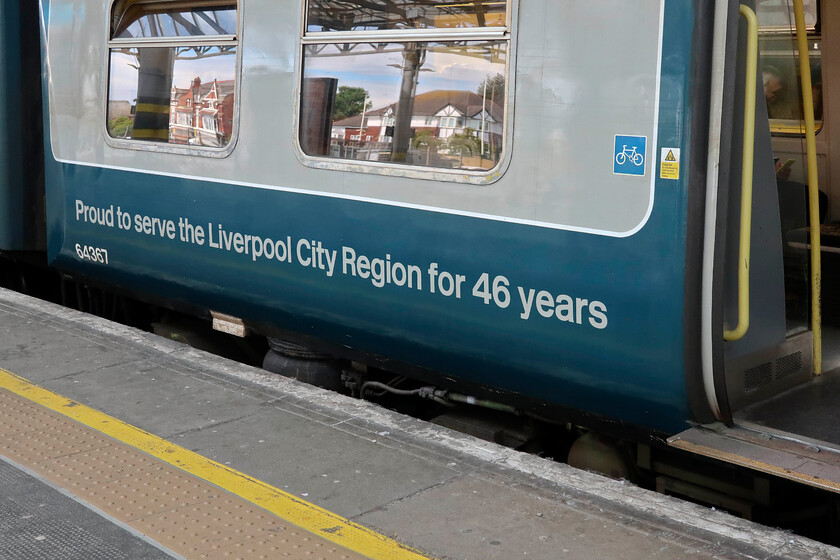 Branding, 507001 (64367), ME 15.27 Southport-Hunts Cross (2U40, 5L), Southport station 
 On arrival at Southport, another pair of Class 507 units were waiting in the adjacent platform to work back to Liverpool. The rear unit of the 15.27 Southport to Hunt's Cross was celebrity set 507001 complete with this branding having been repainted into BR blue and grey. Despite not having air conditioning, the bin windows of the 507s open providing good ventilation. This is more than can be said of the air conditioning fitted to the 777s that is set to high and not withing the control of the crew being set by CAF. Andy and I found the 777s extremely stuffy with no available fresh air. 
 Keywords: Branding 507001 64367 15.27 Southport-Hunts Cross 2U40 Southport station Merseyrail