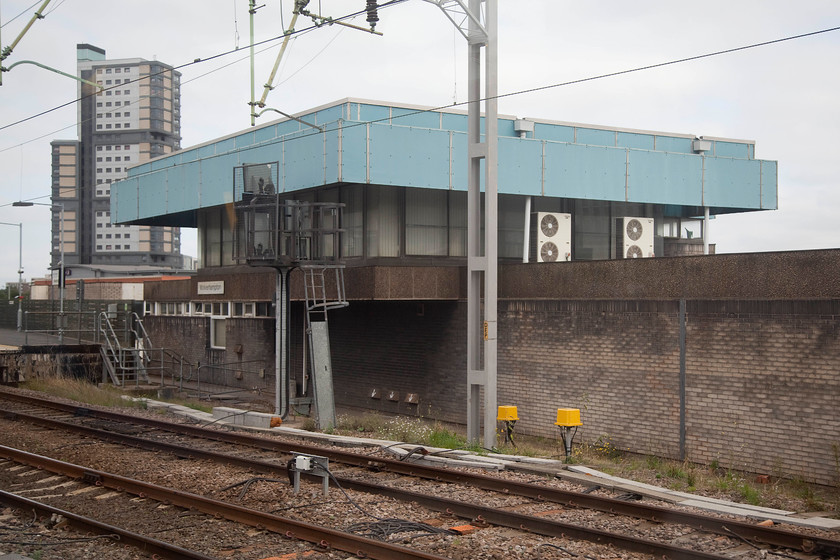 Wolverhampton PSB (BR, 1965) 
 Taken from the train, Wolverhampton PSB is seen just to the south of the station. Even though it looks to be in use, complete with its nameboard, it does nor signal trains and is in use by other rail personal. 
 Keywords: Wolverhampton PSB