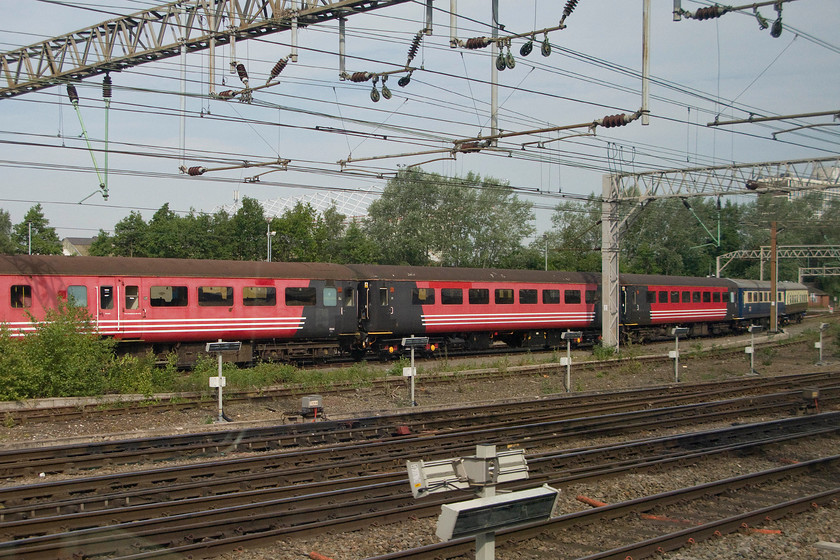 Various coaching stock, Crewe South 
 Three former Virgin Mk. IIf coaches stand looking rather faded at Crewe South. To the left is a BSO followed by two TSOs. Beyond that is a former Riviera Trains TSO and a Mk. I in chocolate and cream. 
 Keywords: Various coaching stock Crewe South