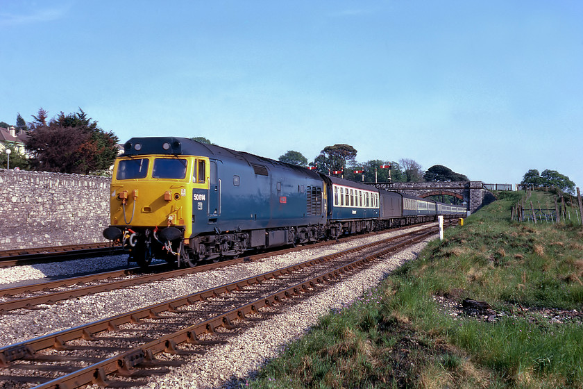 50014, Paignton-Newton Abbot ECS, Aller Junction 
 I got a bit excited and was obviously a little overcome by this train as I took three different images of it, this one being the first! 50014 'Warspite' leads a Paignton to Newton Abbot empty coaching stock train that is coming to a halt at a signal at danger to the north of Aller Junction. The train had worked to Paignton earlier, but I did not notice the restaurant car at the tail end (now behind the locomotive) that passengers would not have been able to use due to it being isolated from the rest of the train by a GUV and a BG wagons. 
 Keywords: 50014 Paignton-Newton Abbot ECS Aller Junction Warspite