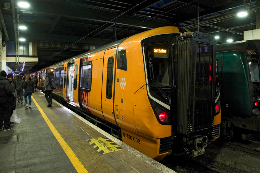 730002, LN 16.15 Tring-London Euston (2T48, 2L), London Euston station 
 Touching in and out I maximised Oyster validity by travelling from Watford Junction right into Euston on the 16.15 ex Tring service. This marked my first journey aboard a Class 730 since their introduction in late 2023. I found the units fast accelerating and roomy, but as for the lighting, I found it extremely bright with the LEDs bringing an intensity that was, for me at least, verging on being too much! 730002 stands on the blocks at Euston having terminated. 
 Keywords: 730002 16.15 Tring-London Euston 2T48 London Euston station