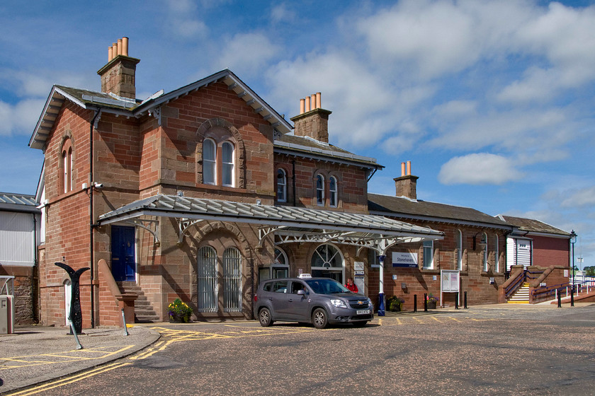 Frontage, Stonehaven station 
 The grand frontage of Stonehaven station is seen complete with its original canopy. It was built 1849 in an Italianate style by the Aberdeen Railway Company. In the late nineteenth century, it was extended with the addition of the single-storey wing to the right in this image in a similar style. The station was comprehensively restored by Railtrack in 2000. It is a Grade B listed structure according to Historic Environment Scotland and in my opinion, this status is thoroughly deserved. 
 Keywords: Frontage Stonehaven station