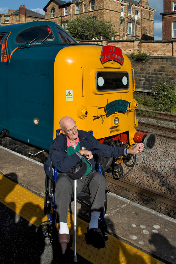 Harry Wilson, 55009 (55013), the return leg of The Coronation Deltic, 17.10 Scarborough-London King's Cross (terminated at Finsbury Park) (1Z56, 71L), Scarborough station 
 I hope that former ECML centenarian driver Harry Wilson had a nice few hours in Scarborough whilst waiting for the return trip to York behind 55009 'Alycidon' dressed up for the day as his favourite member of the class 55013 'The Black watch'. He is seen in front of the locomotive at Scarborough station prior to departure. 
 Keywords: Harry Wilson 55009 55013 the return leg of The Coronation Deltic 17.10 Scarborough-London King's Cross terminated at Finsbury Park1Z56 Scarborough station The Blacl Watch Alycidon