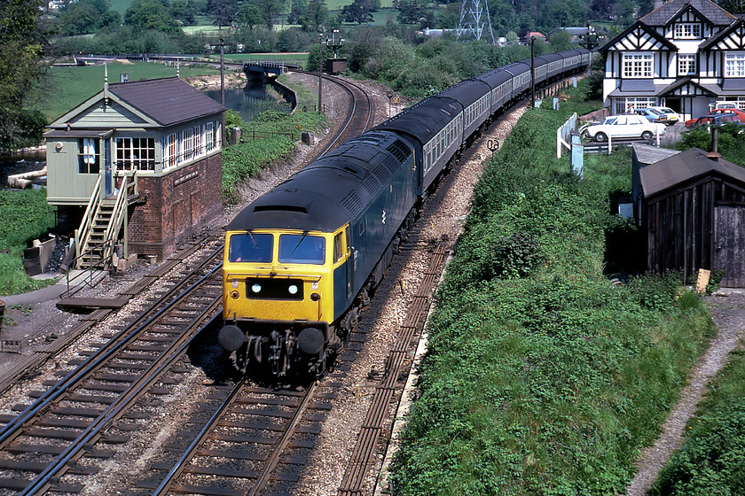 47121, 09.30 London Paddington-Paignton, Cowley Bridge Junction 
 47121 rounds the curve on the approach to Exeter at Cowley Bridge Junction leading the 09.30 Paddington to Penzance service. The Barnstaple line seen curving off to the left used to be doubled and was the L&SWR's route to the West Country and one that is being given serious consideration today for reopening thus avoiding the troublesome South Devon coastal stretch. However, Cowley Bridge is not without its problems being very prone to flooding. Network Rail has undertaken considerable flooding resilience work to improve matters but one cannot get away from the fact that it lies at the confluence of two rivers, the Exe and the Yeo, that both handle large volumes of runoff from south Exmoor during times of heavy rain. 
 Keywords: 47121 09.30 London Paddington-Paignton Cowley Bridge Junction