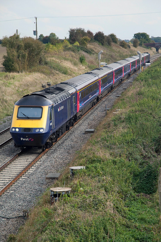 43135 & 43063, GW 11.45 London Paddington-Bristol Parkway (1U28), Bourton SU228874 
 Bourton is a small village in west Oxfordshire that has a population of just over 300. It is adjacent to the GWML and is close to the site of the old Shrivenham station that is just beyond the bridge in the distance. In fact, it is nearer to the station site than Shrivenham itself! 43135 and 43063 power the 11.45 Paddington to Bristol Parkway past the village. The train was terminating at Bristol's Parkway station due to engineering works in the Severn Tunnel associated with the forthcoming electrification. 
 Keywords: 43135 43063 11.45 London Paddington-Bristol Parkway 1U28 Bourton SU228874