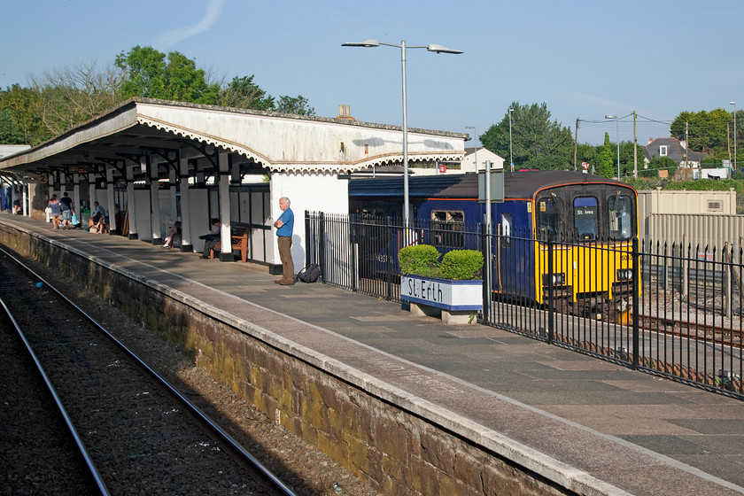 Class 150, 07.59 St. Erth-St.Ives (2A05, RT), St 
 On arrival at St. Erth station an unidentified class 150 is seen waiting in the bay platform This 150 connects with the Sleeper, that we are on, and will then work the 2A05 07.59 to St. Ives. 
 Keywords: Class 150, 07.59 St. Erth-St.Ives 2A05 St. Erth station