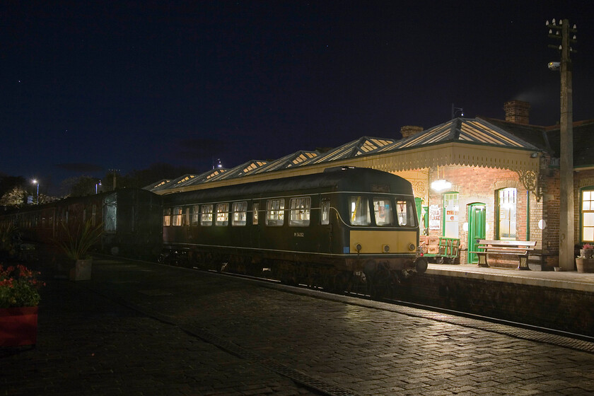 M56352, waiting for the Halloween special, Sheringham station 
 Under a star-lit sky at Sheringham station one of the North Norfolk Railway's resident Class 101 DMUs rests before being prepared for a Halloween special that will run later in the evening making a return run to Holt. Heritage railways have to operate services such as this to keep the cash rolling in and very lucrative they can be too if run and organised well. 
 Keywords: M56352 waiting for the Halloween special Sheringham station