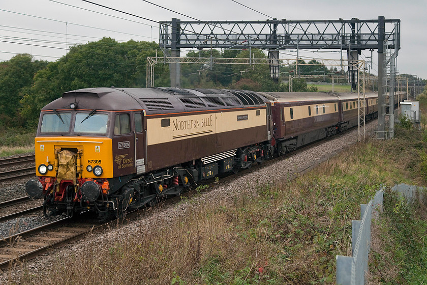 57305 & 57312, outward leg of The Northern Belle, 06.32 Preston-London Victoria (1Z66), Roade Hill 
 57305 'Northern Princess' leads the smart Northern Belle charter past Roade Hill in south Northamptonshire that left Preston at 06.32 fro London Victoria. Out of sight on the rear is 57312 'Solway Princess'. 
 Keywords: 57305 57312 The Northern Belle 06.32 Preston-London Victoria 1Z66 Roade Hill