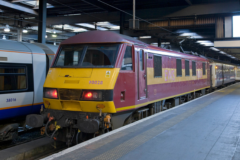 90028, SR 21.43 Aberdeen, 20.44 Inverness & 19.50 Fort William-London Euston sleeper (1M16), London Euston station 
 90028 rests on the blocks at London Euston having recently arrived with the 1M16 Highland Sleeper. In the coming year or so the ageing Mk. III sleeper coaches will be withdrawn in favour of new stock that has been ordered that will offer a new level of comfort and facilities for travellers. It's a strange thing, but I made a journey to York back in 1980 to photograph the steam heated Mk. 1 sleepers stock before its withdrawal and here we are again with their predecessors now facing the chop some thirty-five years later, see.... https://www.ontheupfast.com/p/21936chg/29831158604/x55019-20-05-aberdeen-london-king Andy and I have vowed that we will use the Mk. III sleeper before the new stock arrives; we will see! 
 Keywords: 90028 21.43 Aberdeen 20.44 Inverness 19.50 Fort William-London Euston sleeper 1M16 London Euston station Caledonian Sleeper Highland Sleeper