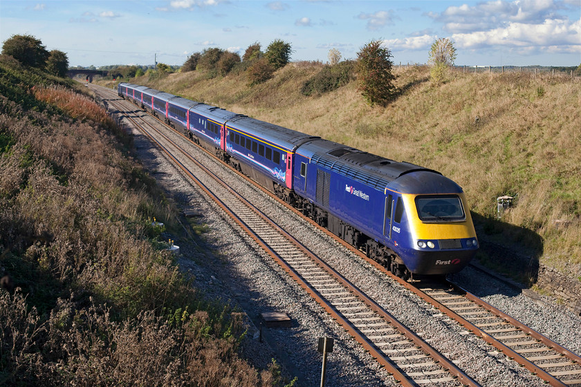 43035 & 43162, GW 12.30 Bristol Temple Meads-London Paddington (1A17), Bourton SU233875 
 43035 leads 43162 'Exeter Panel Signal Box 21st Anniversary 2009' past the lovely bridge just outside of Bourton, a small village on the Oxfordshire and Wiltshire county boundary. The HST is forming the 1A17 Bristol Temple Meads to London Paddington and it looks superb passing in the lovely warm autumnal sunshine. 
 Keywords: 43035 43162 GW 12.30 Bristol Temple Meads-London Paddington 1A17 Bourton SU233875