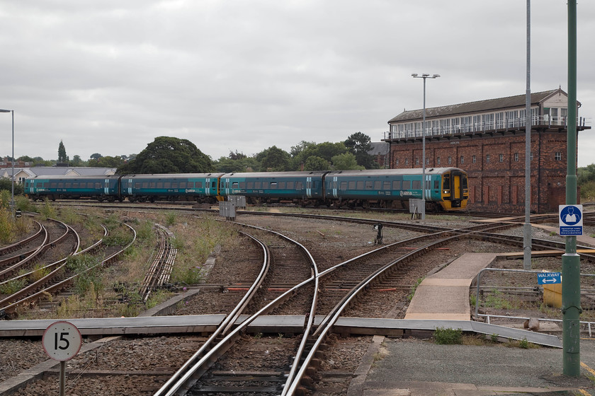 158834, AW 11.10 Birmingham International-Holyhead (1D13), Shrewsbury station 
 159834 negotiates the trackwork as it approaches Shrewsbury station passing Severn Bridge Junction signal box. It is forming the 11.10 Birmingham International to Holyhead service. This is another through route that I have on my 'to-do' list 
 Keywords: 158834 11.10 Birmingham International-Holyhead 1D13 Shrewsbury station