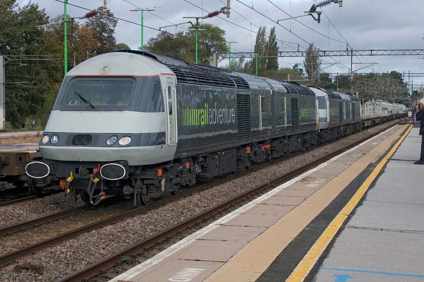 43480, 43468, 43465 & 43484, 05.01 Kirkdale CS-Wembley Yard (6Z81, 34L), Northampton station 
 Having delivered a new class 777 to Mersyrail self-titled 'interim operator' rail adventure HST/barrier coach combo heads south ready for its next delivery. The four HST power cars are becoming a familiar sight now due to the number of new stock moves now taking place with many of these new and expensive machines going straight into storage; you couldn't make it up, could you? The power cars are all ex-Grand Central units that first saw use in the ECML up to forty-five years ago, 43480, 43468, 43465 and 43484. 
 Keywords: 43480 43468 43465 43484 05.01 Kirkdale CS-Wembley Yard 6Z81 Northampton station HST Rail Adventure