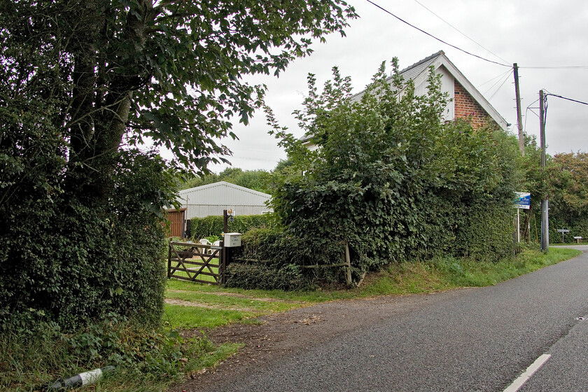 Former French Drove signal box (GN, 1882) & site of level crossing 
 When last on the market French Drove signal box sold for an astounding 300,000 but it does come with a large area of former railway land. It is barely visible in this view taken from the former level crossing with the scene being completely open when I last visited over forty years ago, see.... https://www.ontheupfast.com/p/21936chg/30046908481/french-drove-signal-box-gn-great! Behind the box, partially occupying former railway land where the up loop and mainline once ran is the Rosebay naturist campsite. I suspect that the rampant tree growth comes in handy with them! 
 Keywords: Former French Drove signal box GN 1882 site of level crossing