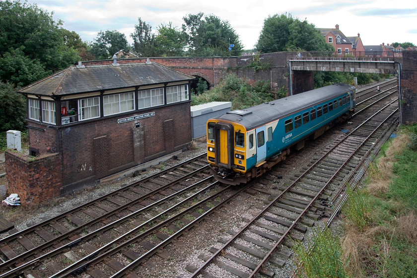 153323, AW 09.33 Swansea-Shrewsbury (2M08), Sutton Bridge Junction 
 Nearing the end of its journey traversing the Central Wales Line, 153323 passes Sutton Bridge Junction signal box working the 09.33 Swansea to Shrewsbury. This 118 mile journey passing through some beautiful countryside has taken this train just over four hours, and what a way to spend those hours! 
 Keywords: 153323 09.33 Swansea-Shrewsbury 2M08 Sutton Bridge Junction