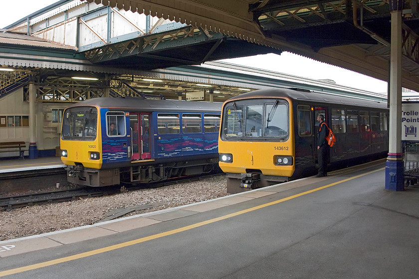 142620, GW 18.59 Exmouth-Paignton (2T27, 1L) & 143612, GW 18.14 Barnstable-Exmouth (2F53, RT), Exeter St.David's stationjpg 
 To the left 142620 is about to leave Exeter St. David's with the 18.59 Exmouth to Paignton. To the right, 143612 waits to leave with the 18.14 Barnstable to Exmouth. St. David's is a busy station that retains much of it GW character and features and every time I visit it brings back memories of hours spent here in my youth, but then the trains were a little more interesting! 
 Keywords: 142620 2T27 143612 2F53 Exeter St. David's station