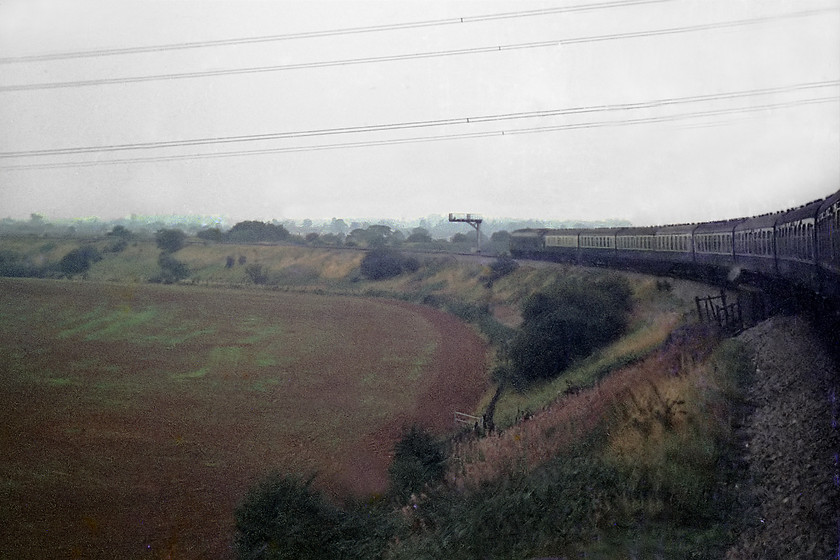 46025, unidentified up working (Bristol TM-Birmingham NS), Westerleigh Curve 
 A dark and misty autumn morning sees 46025 accelerating around Westerleigh Curve just north of Bristol. We were travelling from Bristol to Birmingham and were routed via Worcester. The picture is taken from the back of the train to emphasise the tightness of the curve. Notice the wisp of steam a few coaches forward indicating that 46025's boiler is going well. 46025 was withdrawn in 1981, only to be reinstated and then withdrawn again in 1984, finally, it was broken up at Doncaster.