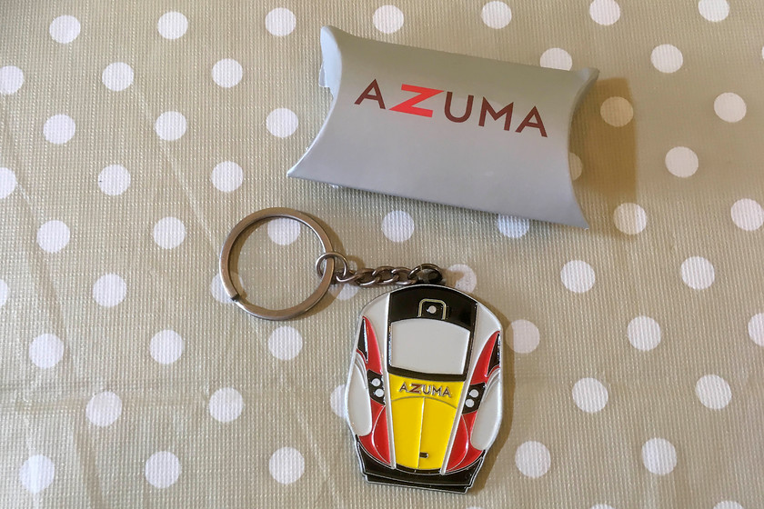 Azuma commemorative keyring 
 The following day from our visit, the Azumas entered public service. By pure chance, a friend of mine, who has the misfortune to be a Leeds United supporter, made the journey from Peterborough to Leeds on one of the first Azuma workings. He was given a nice bag with some goodies to commemorate the event including this keyring that he kindly donated to me. Unfortunately, the purpose of his visit to Leeds was to attend their Championship play-off semi-final with Derby when they were knocked out. 
 Keywords: Azuma commemorative keyring