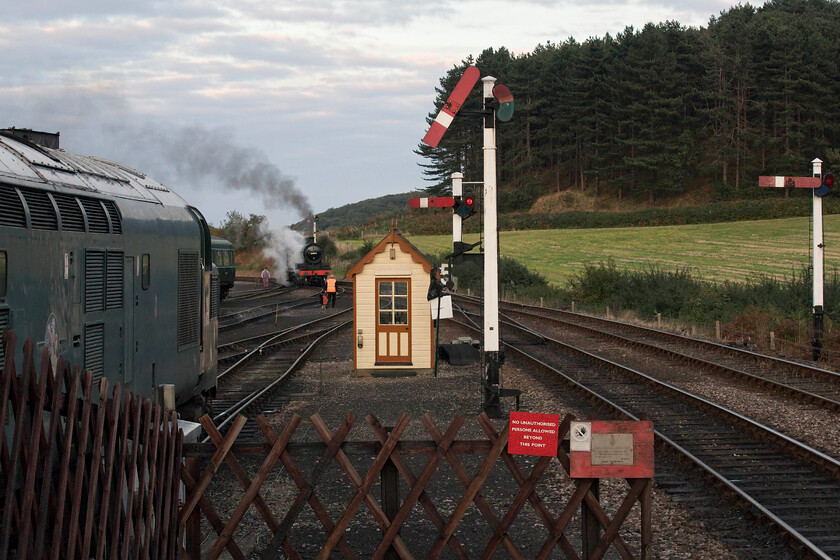 53809, being readied & D6732 stabled, Weybourne Yard 
 With one of the North Norfolk Railway's authentic timber armed summersault signals already pegged former S & D 7F 53809 appears to have reached boiler pressure in readiness to leave the confines of the yard. It will then run light engine to Sheringham to work the evening dining train. 
 Keywords: 53809 D6732 Weybourne Yard 37032