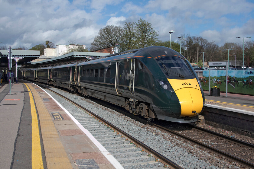 800013, GW 15.59 Cheltenham-London Paddington (1L82, 29L), Cheltenham station 
 Having spent a short time stabled in Alston sidings to the north of the station 800013 arrives back in Cheltenham Spa station ready to work the 15.59 to Paddington. Notice the mural to the right of the train paying homage to Cheltenham's horse racing heritage being off course home to the March festival with its Callender topping Gold Cup race. 
 Keywords: 800013 15.59 Cheltenham-London Paddington 1L82 Cheltenham station