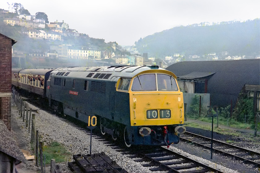 D1013, 16.45 Kingswear-Paington, KIngswear SX884514 
 D1013 'Western Ranger' brings the 16.45 Kingswear to Paingnton out of Kingswear that can be seen in the background. To take this picture I surmounted a small concrete hut using all my Spiderman techniques, needless to say I was the only person there! 
 Keywords: D1013, 16.45 Kingswear-Paington, KIngswear SX884514