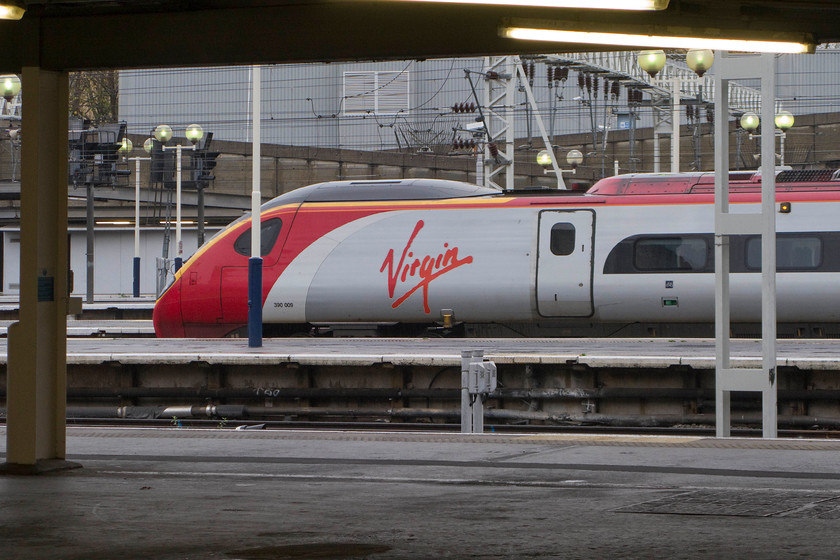 390009, VT unidentified working, London Euston station 
 390009 'Treaty of the Union' stands at Euston station. Unfortunately, I have not been able to identify what working this Virgin Pendolino was to form. 
 Keywords: 390009, VT unidentified working, London Euston station