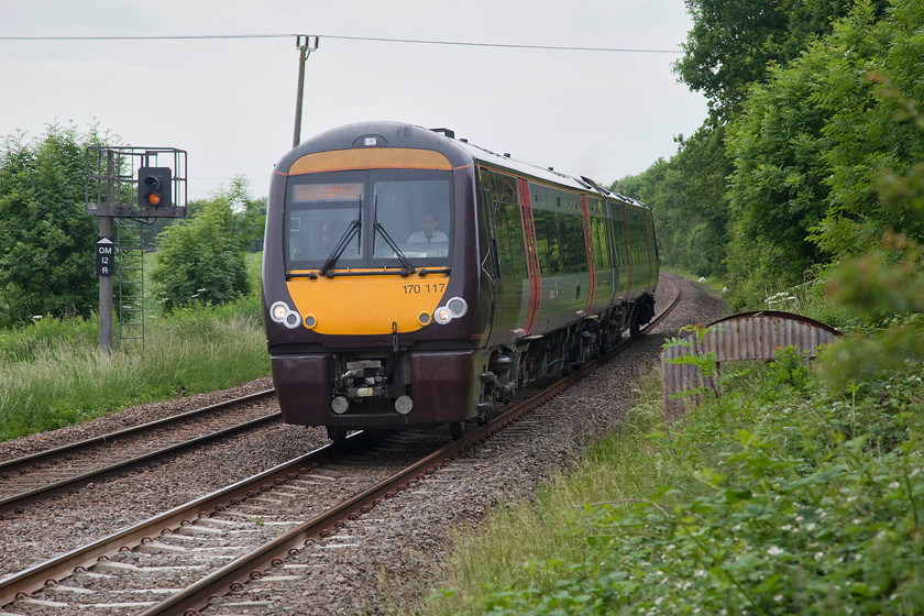 170522 XC 14.22 BNS-Standsted Airport (1L44, RT), Egleton SK869070 
 17522 passes Egleton about half-way between Oakham and Manton Junction working the 14.22 Birmingham New Street to Stansted Airport. Note the roofless remains of the corrugated linesman's hut on the right as well as Oakham's distant signal on the other side of the train. Apologies for the power line pole growing from the roof of the train! 
 Keywords: 170522 1L44 Egleton SK869070