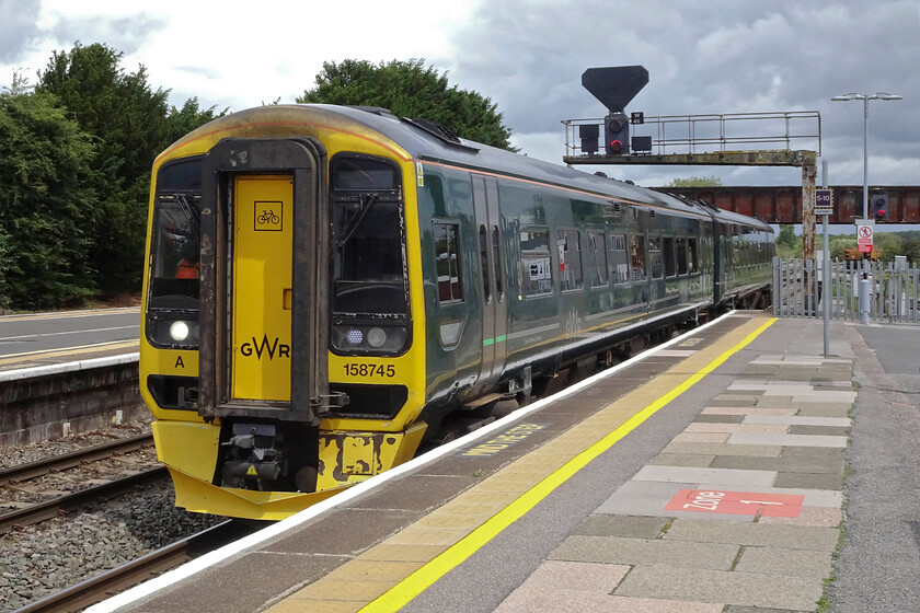 158745, GW 11.42 Bristol Temple Meads-Salisbury (2O10, RT), Westbury station 
 Rather than continue on the charter to Cranmore, Andy I and I decided on a run to Salisbury and back. After the purchase of some return tickets, we travelled on GWR's 11.2 Bristol to Salisbury service worked by 158745. The train is seen entering Westbury station passing on the right the location of the former North signal box that closed in 1984. 
 Keywords: 158745 11.42 Bristol Temple Meads-Salisbury 2O10 Westbury station