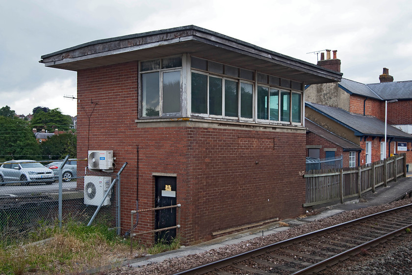 Tisbury signal box (BR, 1958) 
 The closed Tisbury signal box. It was built by British Railways in 1958 and is located just a very short distance from the spot of lovely L & SW structure it replaced dating from 1875. This British Railways' box was only in use for nine years beford being closed in 1967 when much of the line was rationalised. It is still in railway use and must contain some equipment; witness the two air conditioners. 
 Keywords: Tisbury signal box