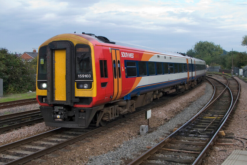 159103, SW 13.20 London Waterloo-Exeter St. David's (1E20), Salisbury station 
 The 13.20 Waterloo to Exterter St. David's service sweeps into Salisbury station worked by 159103. These units are comfortable and relatively fast and have done good work on the former L&SWR mainline route. However, they are not really a substitute for a locomotive hauled set of proper stock are they really, see... https://www.ontheupfast.com/p/21936chg/30033391740/x50011-11-10-london-waterloo-exeter 
 Keywords: 159103 13.20 London Waterloo-Exeter St. David's 1E20 Salisbury station SWT South West Trains