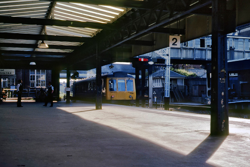 Class 118 (set P481), 17.46 Exmouth-Exeter St. David's, Exeter Central station 
 An atmospheric photograph at Exeter Central station depicts a two-car Class 118 DMU leaving with the 17.46 Exmouth to Exeter St. David's service. The DMU was a long-term West Country resident, built by the Birmingham RC&W set P481 composed of W51327 and W51312. In the background, Exeter Central signal box is seen along with some of its associated semaphores. Notice the two BR staff chatting on the platform end rather than eagerly observing (obsessively even?) a departing train as a 'dispatcher' does today. 
 Keywords: Class 118 set P481 17.46 Exmouth-Exeter St. David's Exeter Central station W51327 W51312