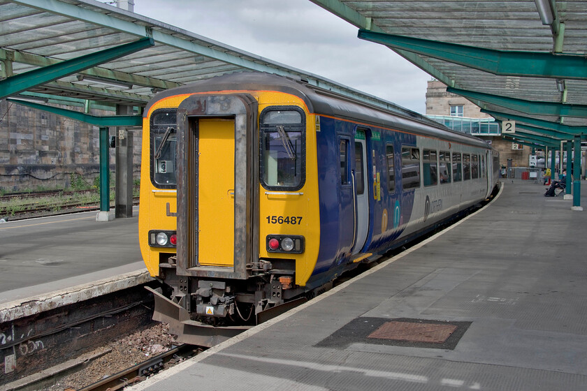 156487, NT 11.07 Carlisle-Barrow-in-Furness (2C50, 2E), Carlisle station 
 Northern's 156487 waits at Carlisle's south-facing double bay platform in a welcome burst of summer sunshine. In a few minutes, it will leave working the 11.07 Carlisle to Barrow-in-Furness 2C50 service. This will travel along the incredibly picturesque Cumbrian Coast route one of the most underrated lines on the network. 
 Keywords: 156487 11.07 Carlisle-Barrow-in-Furness 2C50 Carlisle station Northern Sprinter