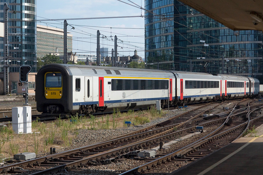 96 515, 17.33 Brussels Midi-Luxembourg (IC 2117), Brussels Nord station 
 The 17.33 Brussels Midi to Luxembourg IC 2117 service is formed by AM96 515. With the financial district of Brussels in the background the train is seen entering Brussels Nord station. On a Sunday afternoon, Nord station was fairly quiet and I was able to wander around with nobody eyeing me suspiciously, even the armed security staff on patrol! There were no barriers at Nord station or any others that I saw on the Belgium network; how refreshing! 
 Keywords: 96 515 17.33 Brussels Midi-Luxembourg IC 2117 Brussels Nord station